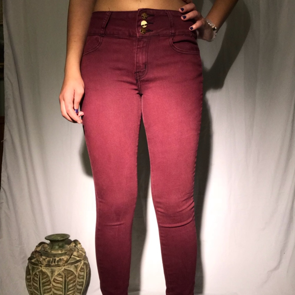 Burgundy mid rise skinny jeans